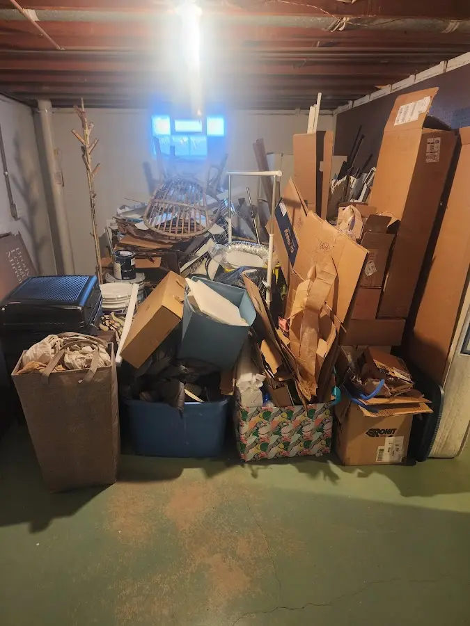 Roll-off dumpster container at job site for 2 Yard Dumpster Rental in Lealman